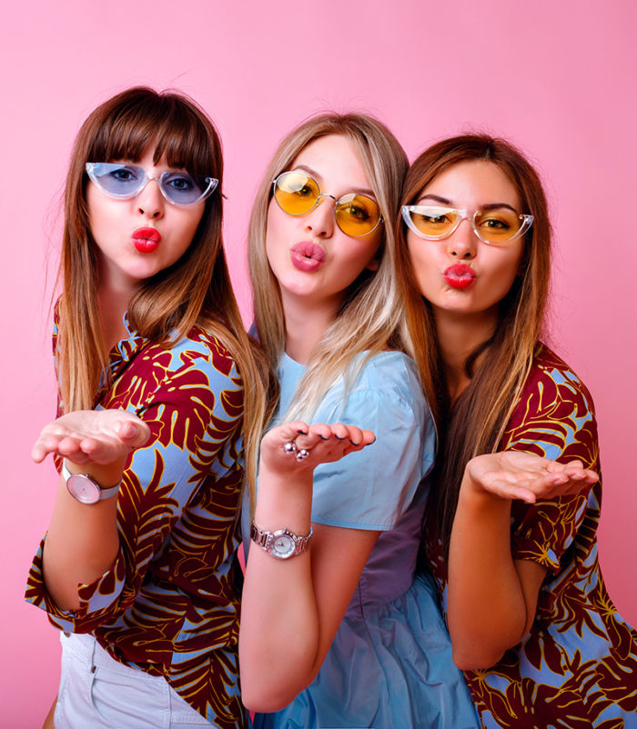Studio portrait of three super exited best friends girls, blissf